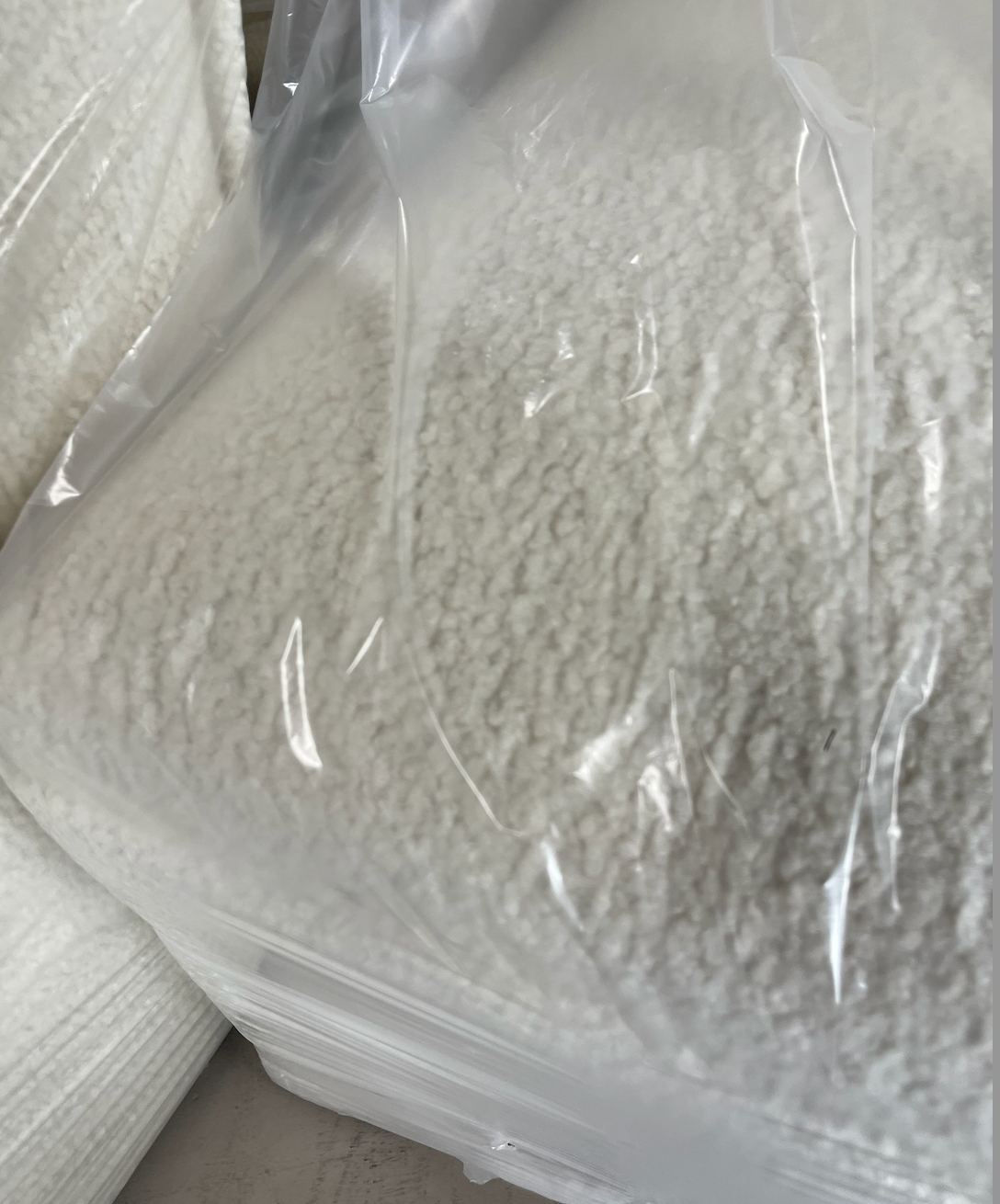 Castered Armless Side Chair Sheepskin Natural