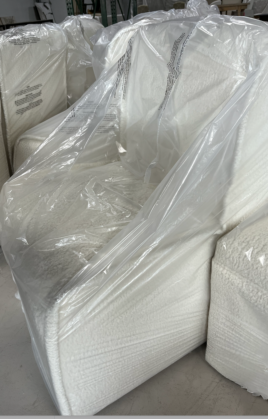 Castered Armless Side Chair Sheepskin Natural