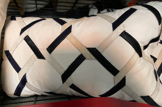 White Lumbar Pillow with Black and Beige Hide Detail